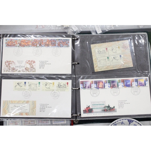 143 - TWO ALBUMS OF STAMPS, ONE CONTAINING FIRST DAY COVERS, THE OTHER, BRITISH STAMPS