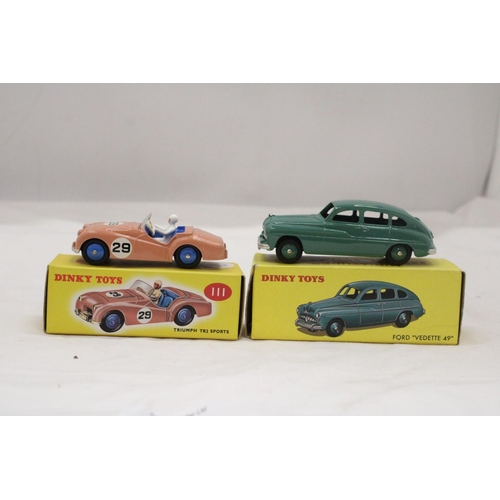 149 - TWO BOXED DINKY CARS, TRIUMPH TR2 SPORTS AND FORD VEDETTE 49