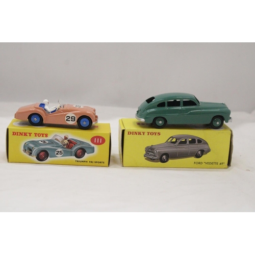 149 - TWO BOXED DINKY CARS, TRIUMPH TR2 SPORTS AND FORD VEDETTE 49