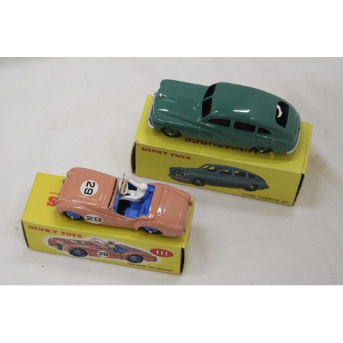 149 - TWO BOXED DINKY CARS, TRIUMPH TR2 SPORTS AND FORD VEDETTE 49