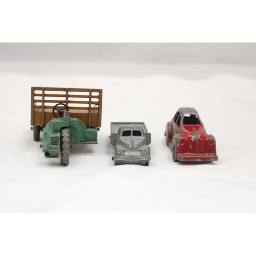 151 - THREE VINTAGE DINKY TOY CARS TO INCLUDE A BEDFORD WAGON, MOTOCART, ETC