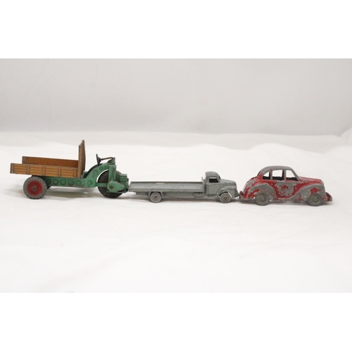 151 - THREE VINTAGE DINKY TOY CARS TO INCLUDE A BEDFORD WAGON, MOTOCART, ETC