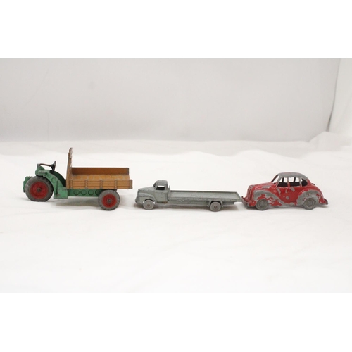 151 - THREE VINTAGE DINKY TOY CARS TO INCLUDE A BEDFORD WAGON, MOTOCART, ETC