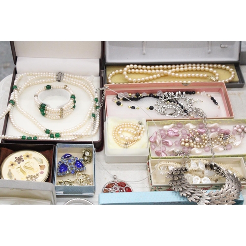 155 - A QUANTITY OF BOXED COSTUME JEWELLERY TO INCLUDE NECKLACES, PEARLS, EARRINGS, BRACELETS, ETC