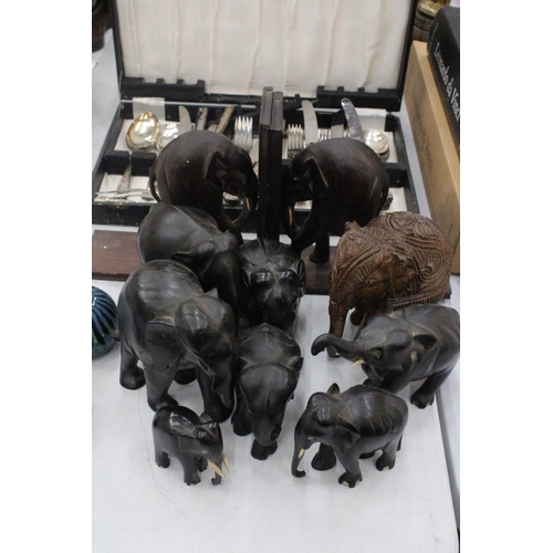 163 - A COLLECTION OF TREEN ELEPHANTS TO INCLUDE BOOK-ENDS