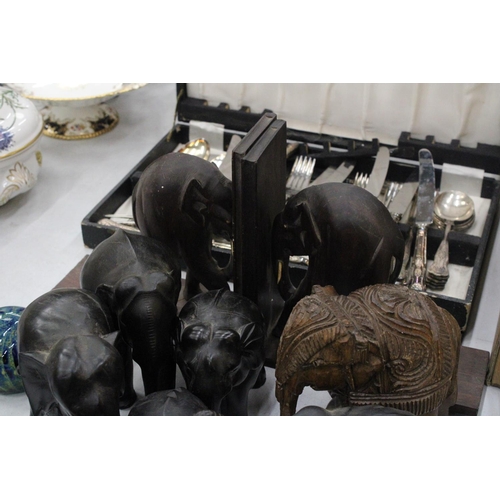 163 - A COLLECTION OF TREEN ELEPHANTS TO INCLUDE BOOK-ENDS