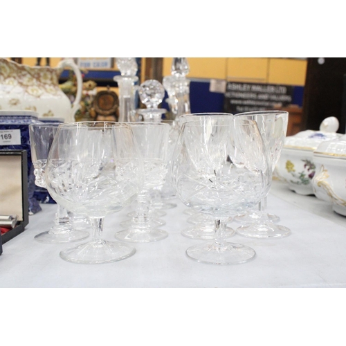 167 - A QUANTITY OF GLASSWARE TO INCLUDEFIVE DECANTERS, WINE GLASSES, SHERRY, BRANDY BALLOONS, ETC