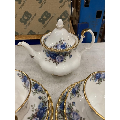 16 - A NINE PIECE SET OF ROYAL ALBERT MOONLIGHT ROSE TO INCLUDE A SMALL TEAPOT, MILK, SUGAR AND TWO TRIOS