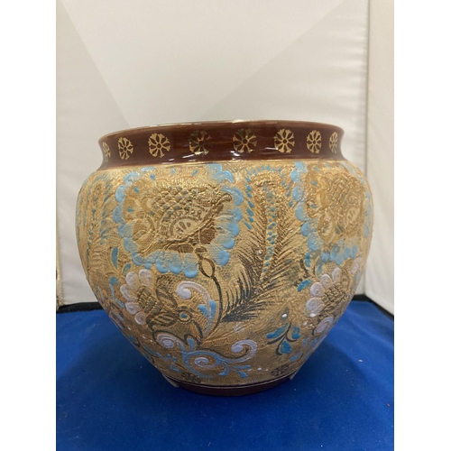 19 - A ROYAL DOULTON LAMBETH CHINE JARDINERE PLANTER HAND DECORATED IN A FLORAL DESIGN WITH TURQUOISE AND... 