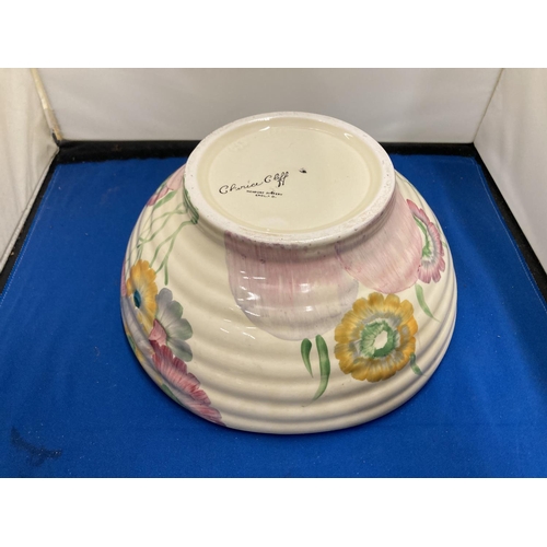 44 - A CLARICE CLIFF NEWPORT POTTERY BOWL   PATTERN HAND PAINTED IN YELLOWS AND PINKS