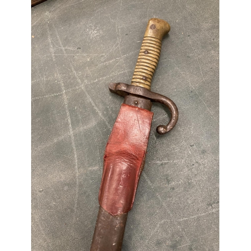 50 - A FRENCH BAYONET IN A SCABBARD