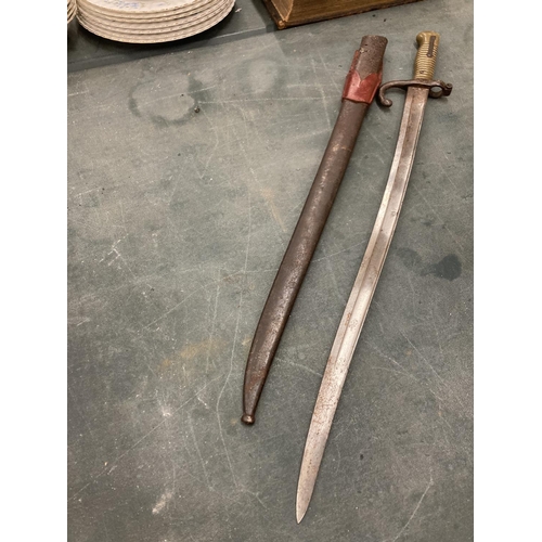 50 - A FRENCH BAYONET IN A SCABBARD