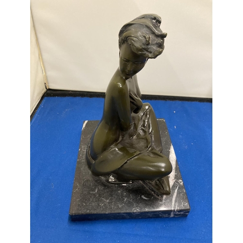 56 - A BRONZE SITTING LADY FIGURE ON A MARBLE BASE