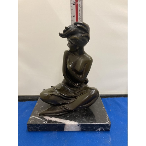 56 - A BRONZE SITTING LADY FIGURE ON A MARBLE BASE