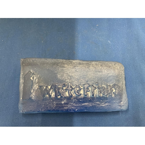 6 - A BLUE GLASS ADVERTISING BLOCK, STAMPED WHITEFRIARS 14CM X 7CM AT WIDEST POINT X 2.5CM