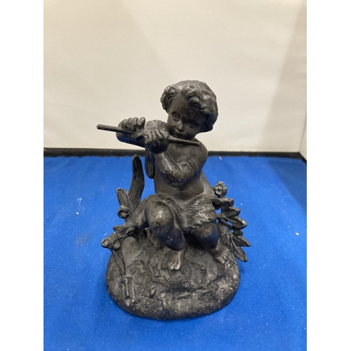 62A - A RESIN FIGURE OF A GIRL PLAYING A FLUTE