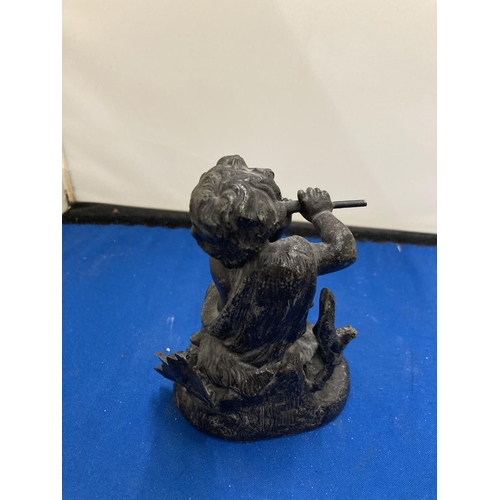 62A - A RESIN FIGURE OF A GIRL PLAYING A FLUTE