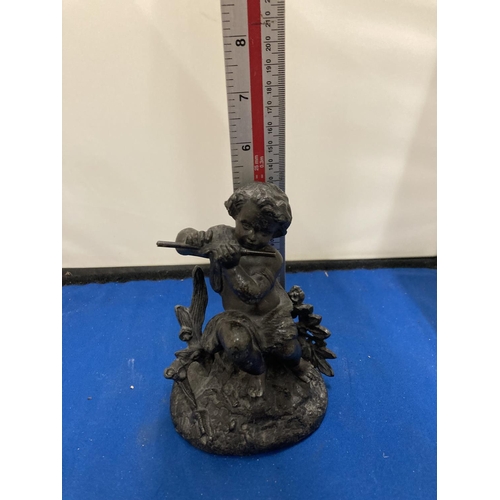 62A - A RESIN FIGURE OF A GIRL PLAYING A FLUTE