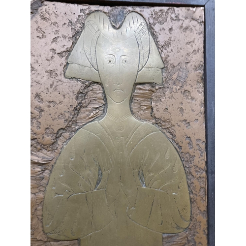 69 - A LARGE BRASS RUBBING PLATE IN A WOODEN FRAME DEPICTING A LADY IN MEDIEVAL DRESS 3'5