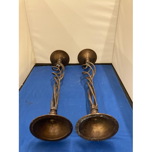 91A - A PAIR OF BRASS OPEN TWIST CANDLESTICKS