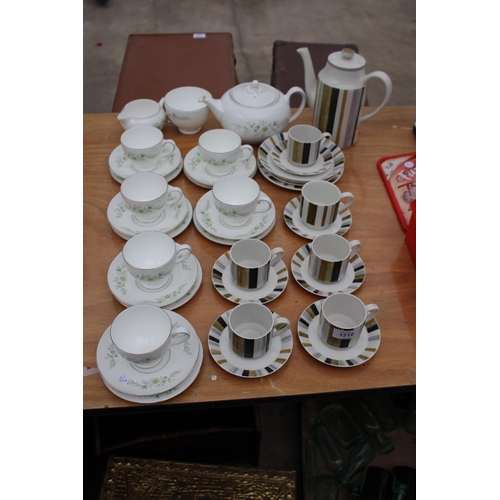 1710 - A RETRO MIDWINTER COFFEE SERVICE SET AND A FURTHER WEDGWOOD TEA SERVICE