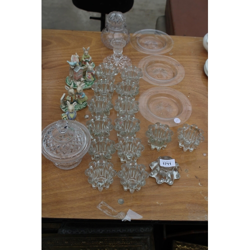 1711 - AN ASSORTMENT OF ITEMS TO INCLUDE GLASS CANDLE HOLDERS, CERAMIC RABBIT FIGURES AND GLASS JARS ETC