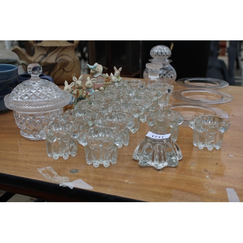 1711 - AN ASSORTMENT OF ITEMS TO INCLUDE GLASS CANDLE HOLDERS, CERAMIC RABBIT FIGURES AND GLASS JARS ETC