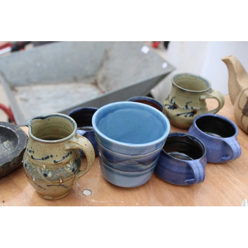 1712 - AN ASSORTMENT OF STUDIO POTTERY TO INCLUDE A KETTLE, JUGS AND CUPS ETC