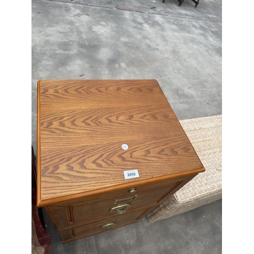 2892 - AN EDWARDIAN STYLE TWO DRAWER FILING CABINET WITH BRASS SCOOP HANDLES