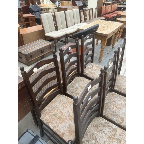 2910 - A SET OF SIX MODERN LADDER-BACK DINING CHAIRS