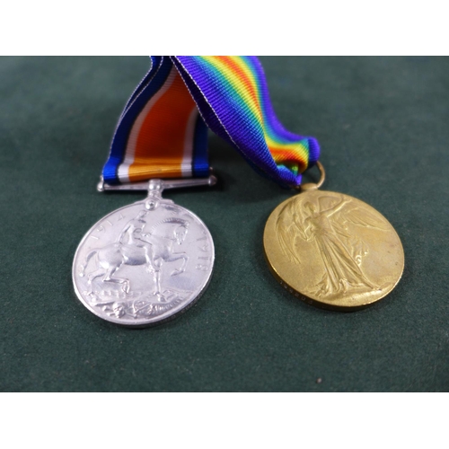 304 - A WORLD WAR I MEDAL PAIR AWARDED TO 199283 GUNNER E EBBORN ROYAL ARTILLERY