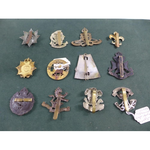 317 - A COLLECTION OF TWELVE MILITARY BADGES TO INCLUDE ROYAL ARTILLERY, SOUTH WALES BORDERERS ETC.