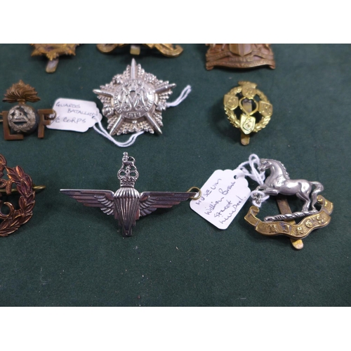 318 - A COLLECTION OF TWELVE MILITARY BADGES, TO INCLUDE PARACHUTE REGIMENT, MACHINE GUN CORPS ETC