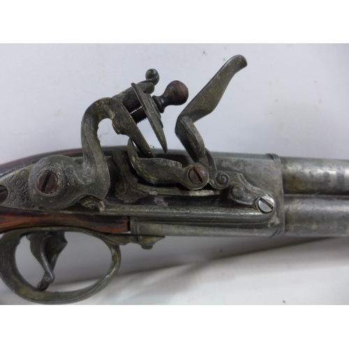 339 - A MODEL DISPLAY NON FIRING FLINTLOCK OVER AND UNDER PISTOL, 24CM BARRELS. LENGTH 42CM (A/F)