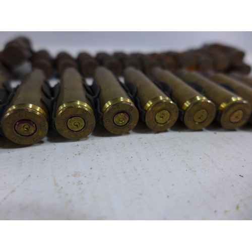 362 - TWO L A24 FIRED MACHINE GUN BELTS AND A LARGE QUANTITY OF FIRED BULLET CASINGS ETC