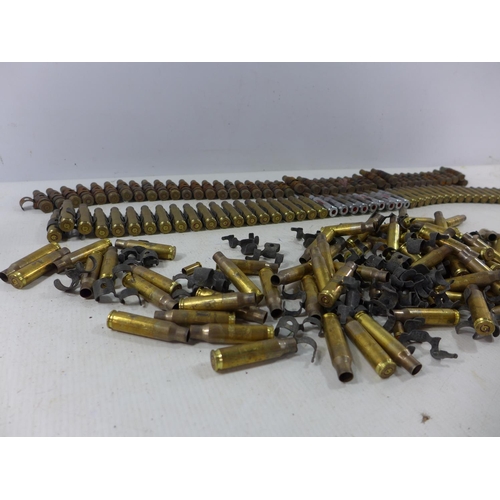 362 - TWO L A24 FIRED MACHINE GUN BELTS AND A LARGE QUANTITY OF FIRED BULLET CASINGS ETC