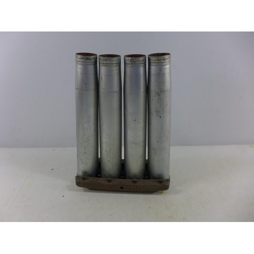 363 - A CLIP OF FOUR FIRED MARK 3 40MM SHELL CASES