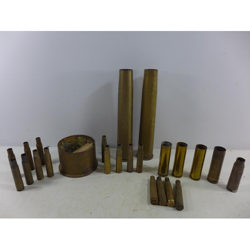 367 - A COLLECTION OF TWENTY FOUR FIRED BRASS SHELL CASES, HEIGHTS FROM 9CM - 31CM