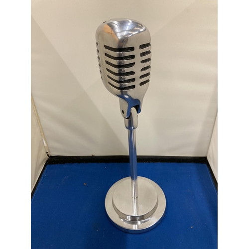 27 - A CHROME MICROPHONE ON A STAND