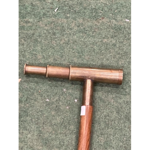 64 - A BRASS AND LEATHER THREE DRAWER TELESCOPE WALKING STICK