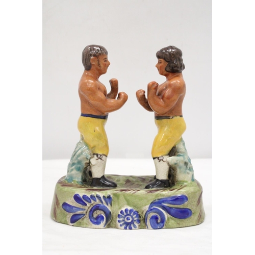 218 - A STAFFORDSHIRE BARE KNUCKLE FIGHTERS FIGURE DEPICTING SPRING AND LANGAN FIGHT