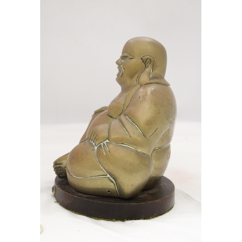 227 - A BRASS BUDDHA ON STAND