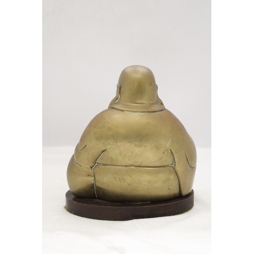 227 - A BRASS BUDDHA ON STAND