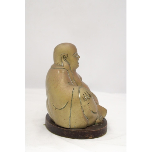 227 - A BRASS BUDDHA ON STAND