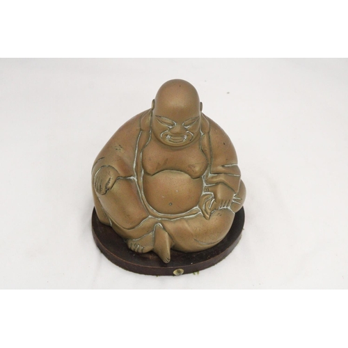 227 - A BRASS BUDDHA ON STAND