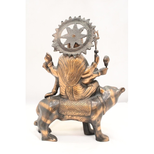 260 - A BRONZE COLOURED, EXOTIC INDIAN MOTHER GODDESS ON A TIGER'S BACK, HEIGHT 38CM, LENGTH 28CM