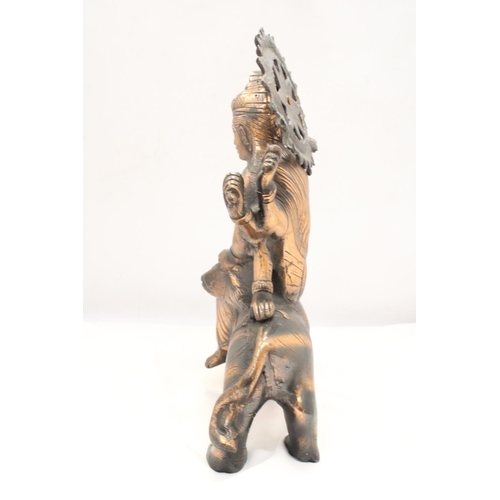 260 - A BRONZE COLOURED, EXOTIC INDIAN MOTHER GODDESS ON A TIGER'S BACK, HEIGHT 38CM, LENGTH 28CM