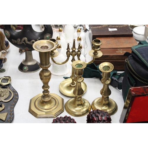 274 - THREE BRASS CANDLESTICKS AND A TWIN FRENCH CANDLEABRA