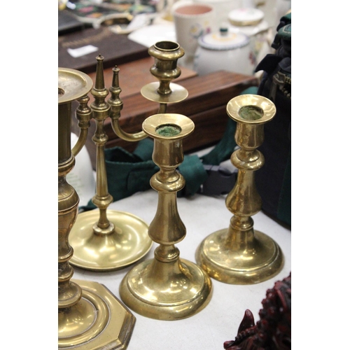 274 - THREE BRASS CANDLESTICKS AND A TWIN FRENCH CANDLEABRA