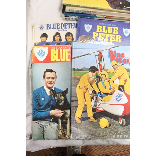 320 - TWELVE BOOKS TO INCLUDE ELEVEN VINTAGE BLUE PETER ANNUALS AND A COPY OF THE KINGS BOOK THE OLD MAN O... 